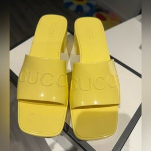Gucci- yellow rubber pool slides